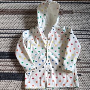 Primary polka dot raincoat